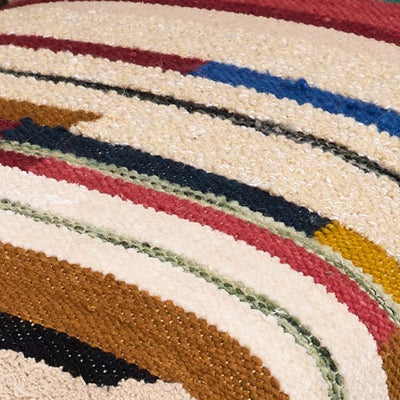 A close-up of a striped upholstered fabric.