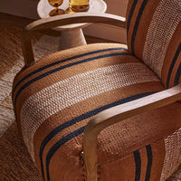AVIATOR ARMCHAIR IN STRIPE RUG