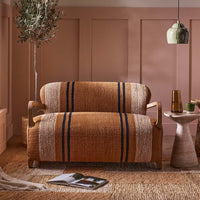 AVIATOR LOVESEAT IN STRIPED RUG