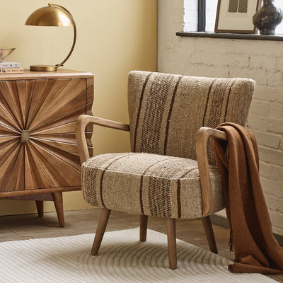 CALVIN IN BROWN STRIPED RUG