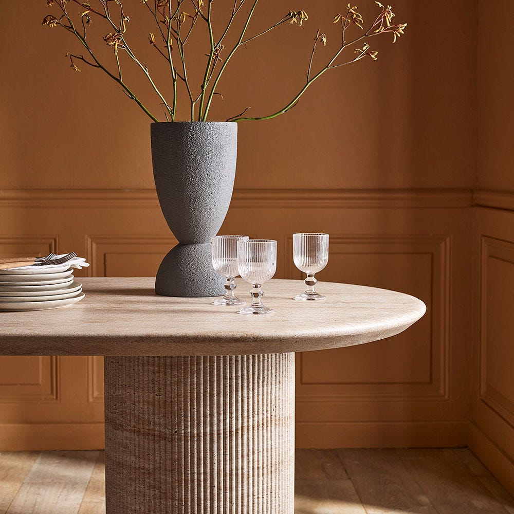 RAINA DINING TABLE IN TRAVERTINE FINISH EFFECT